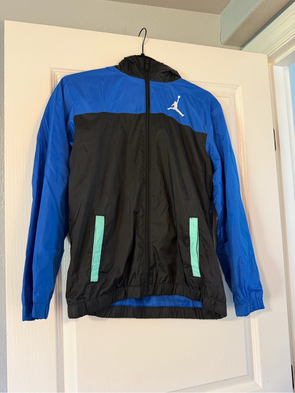 Jordan boys Royal Blue and Black Windbreaker with Mint Pocket Accents